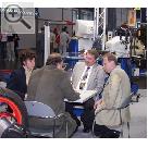 -- AMITEC 2004 --- Reiner Gehlhaar (mitte) und Uwe Markert von GEHLHAAR Werkstatt-Technik.  